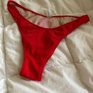Victorias Secret red bathing suit bottom.